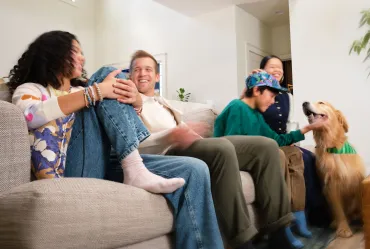 Family on Sofa with Dog
